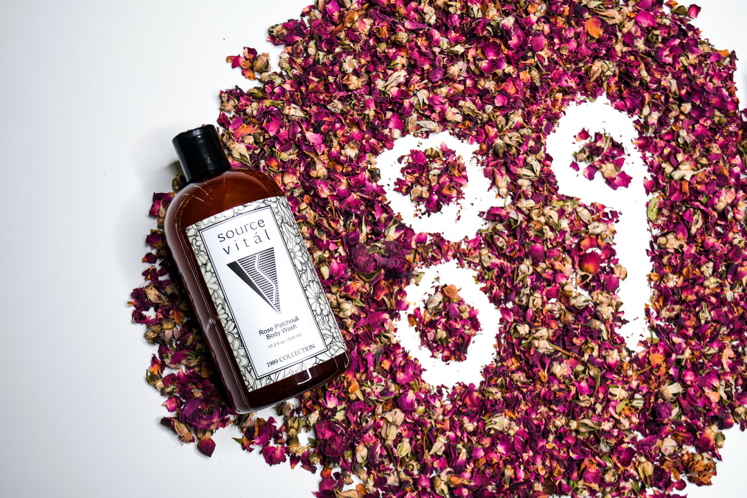 Rose Patchouli Shower Gel on a pile of dried rose petals with "89" carved into it