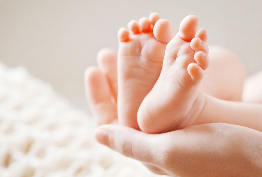 Baby Feet in Mom's hand