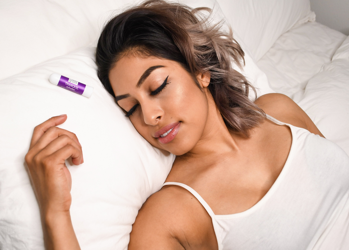 Woman sleeping with Tranquil Inhaler