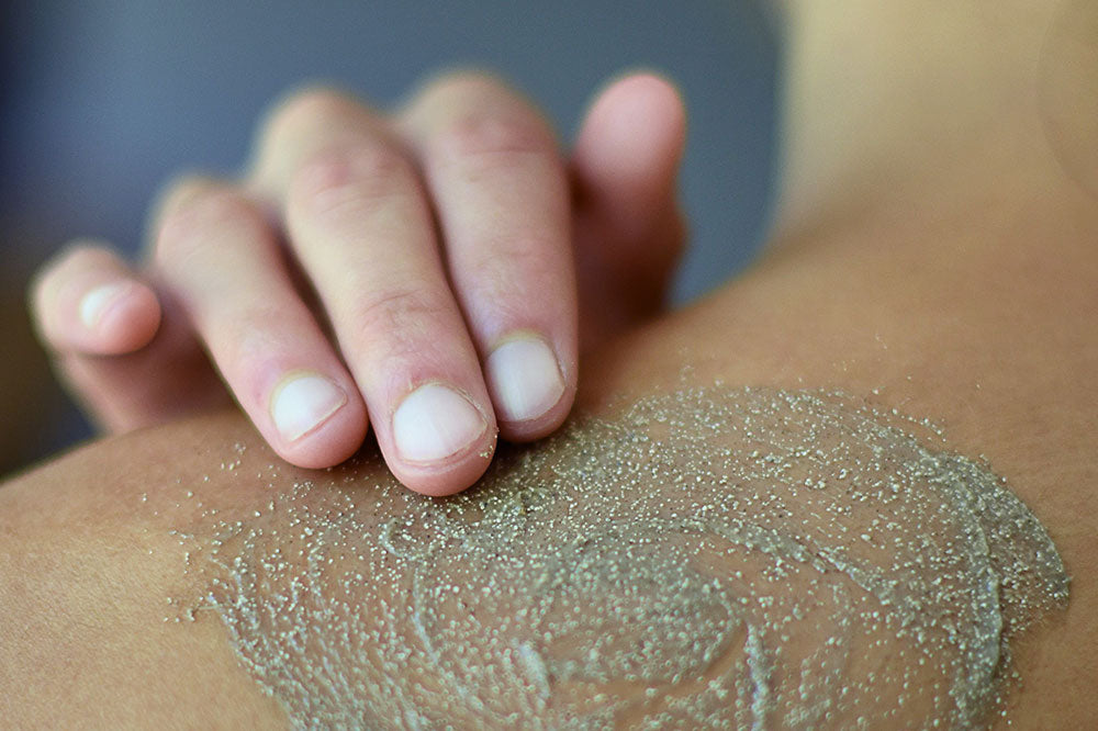 Apply a gentle body scrub to assist with Body Acne