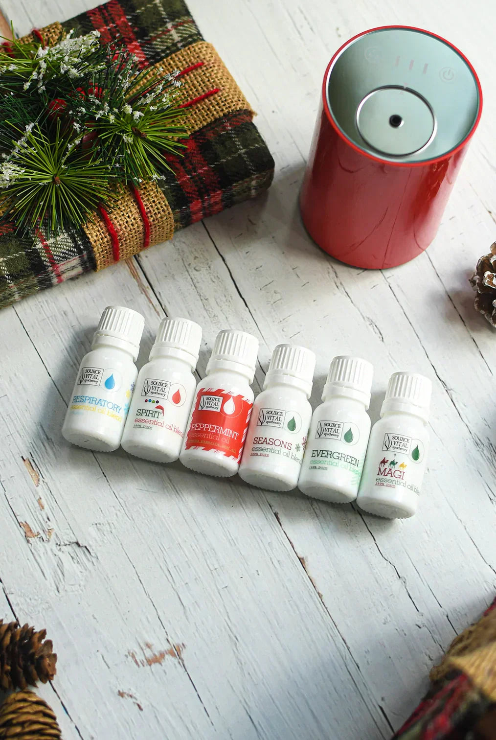 Source Vital Holiday Scents Gift Set with Christmas Gifts Around it