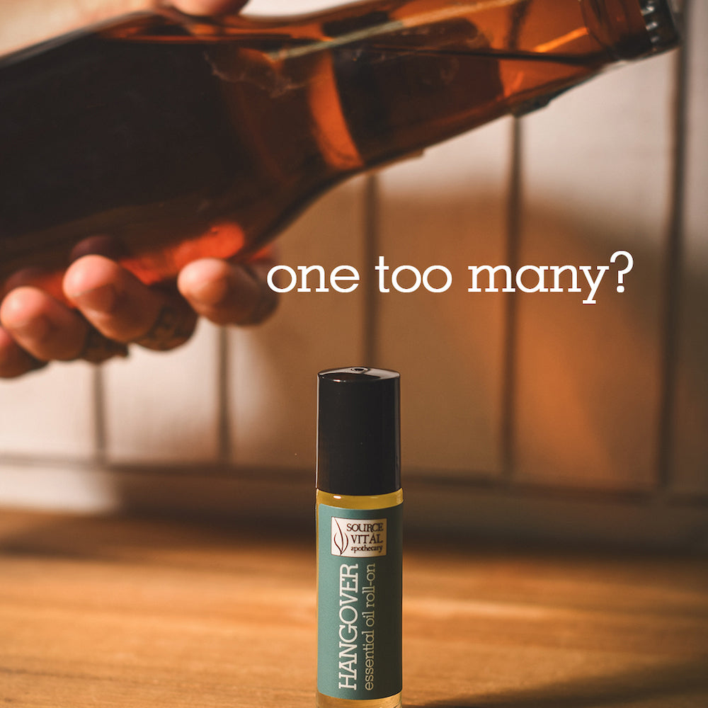 Woman holding amber beer bottle next to a "Hangover" essential oil roll-on. Text states: "One too many?"